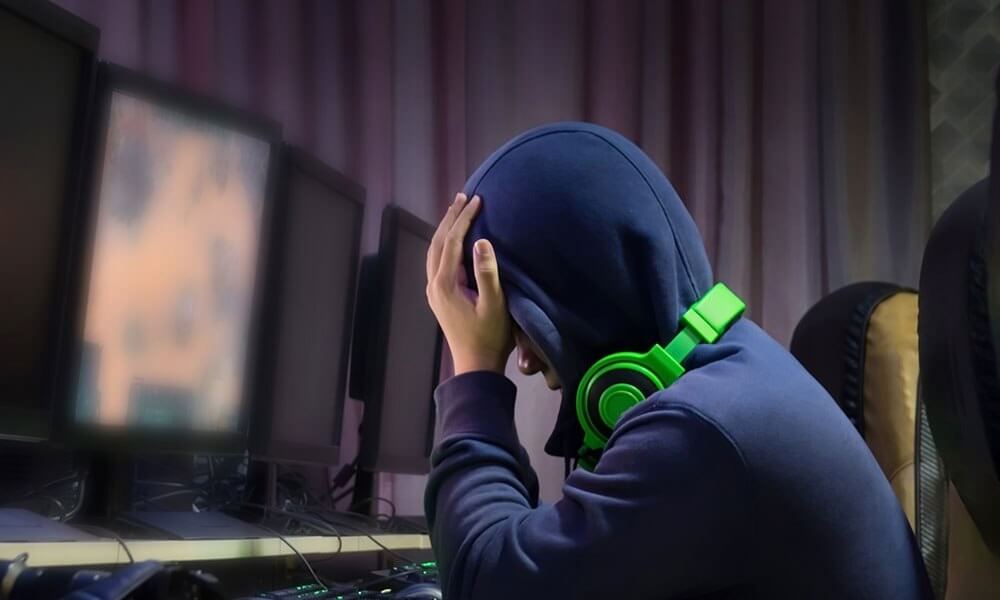young gamer with head in hands1